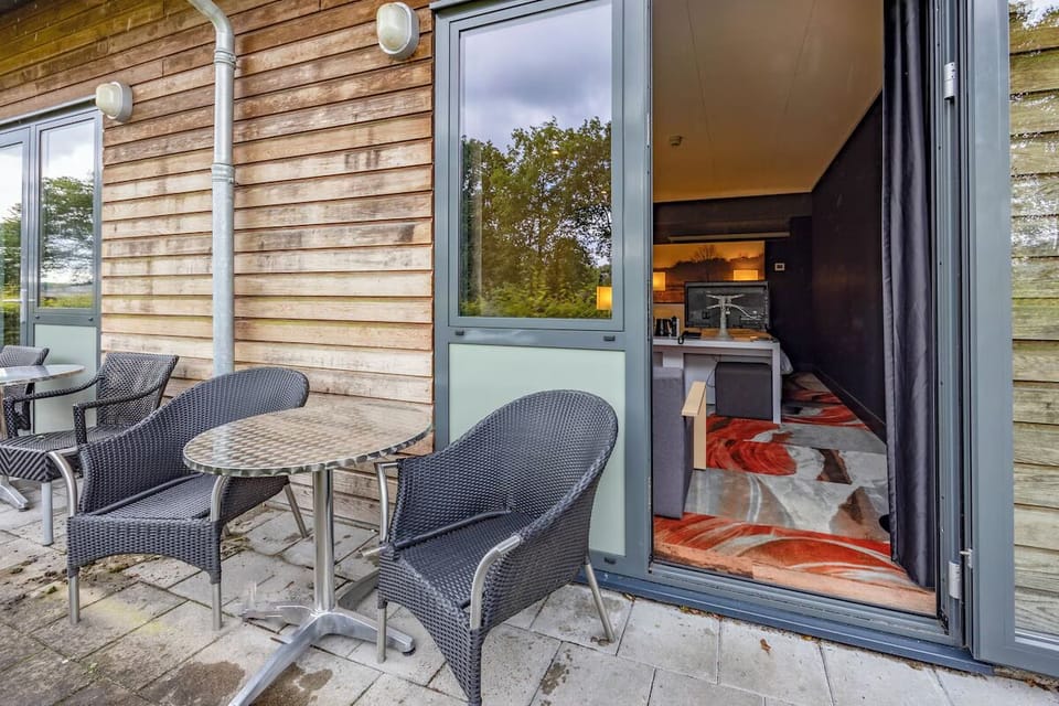 Step outside and sip drinks on your private furnished patio.