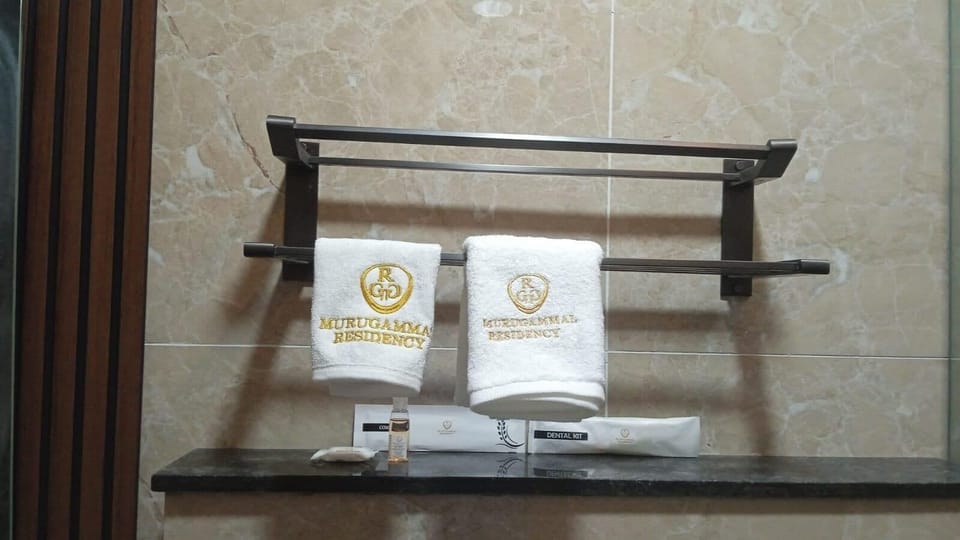 Deluxe Double Room, Bay View | Bathroom amenities | Shower, hair dryer, slippers, towels