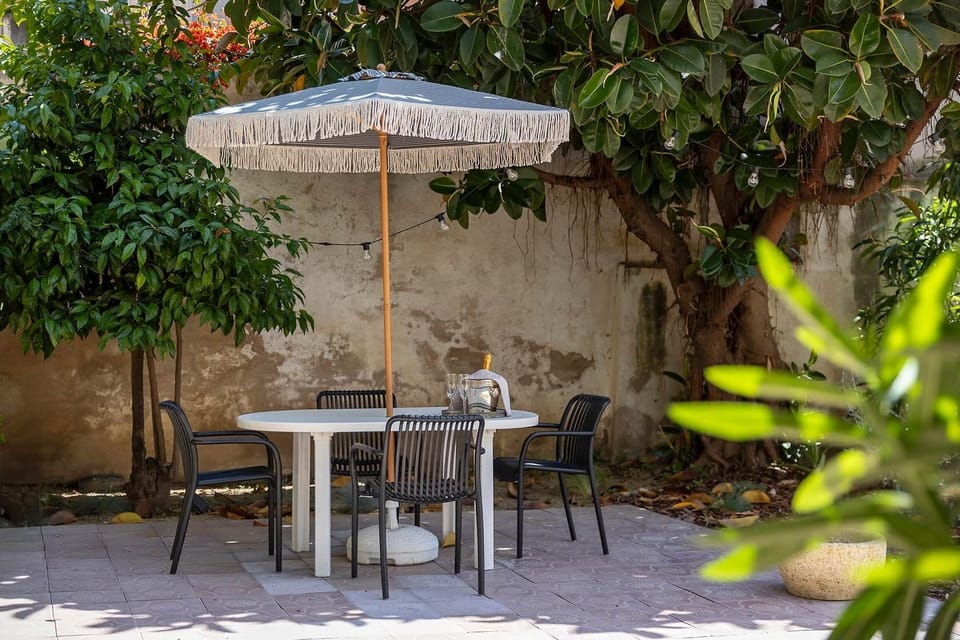 Enjoying the garden at Hotel Vella Nit