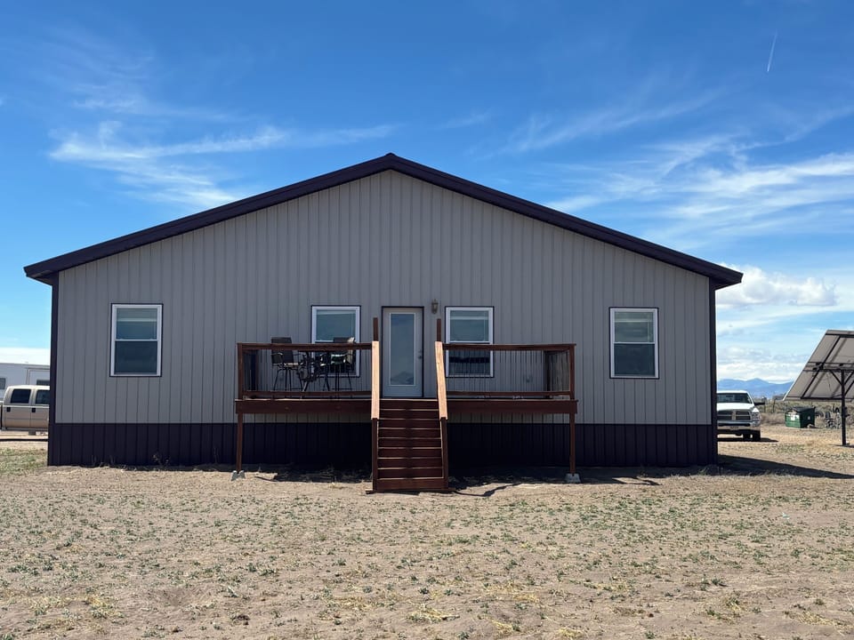 Front porch facing the Sand Dunes and Sangre de Cristo mountains