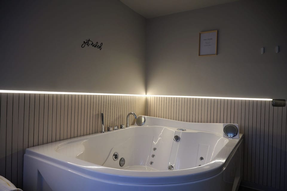 Luxury Studio Suite, Patio, Hill View | Bathroom | Shower, hair dryer, towels, soap