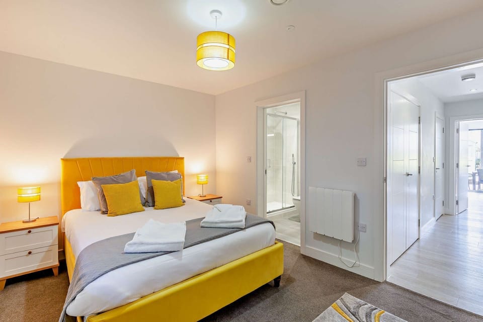 A king-size bedroom at Coral, Devon