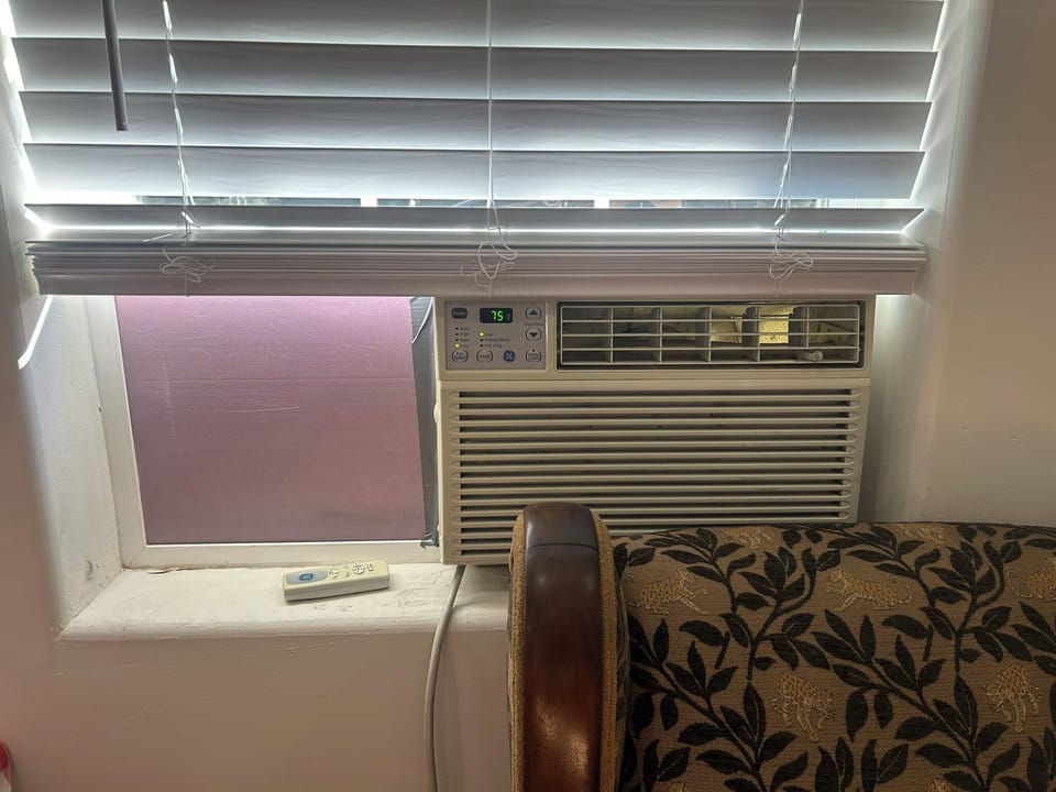 A window A/C unit with remote control is provided during the warm summer months 