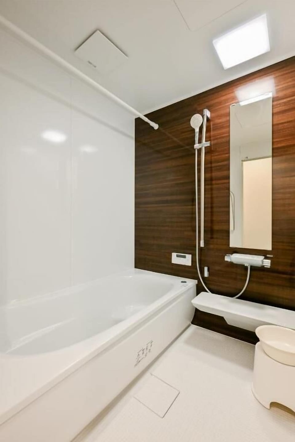 Separate tub and shower, free toiletries, hair dryer, slippers