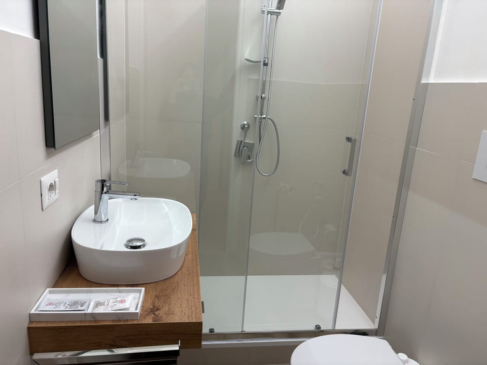 Comfort Double Room, City View | Bathroom | Free toiletries, slippers, towels, soap