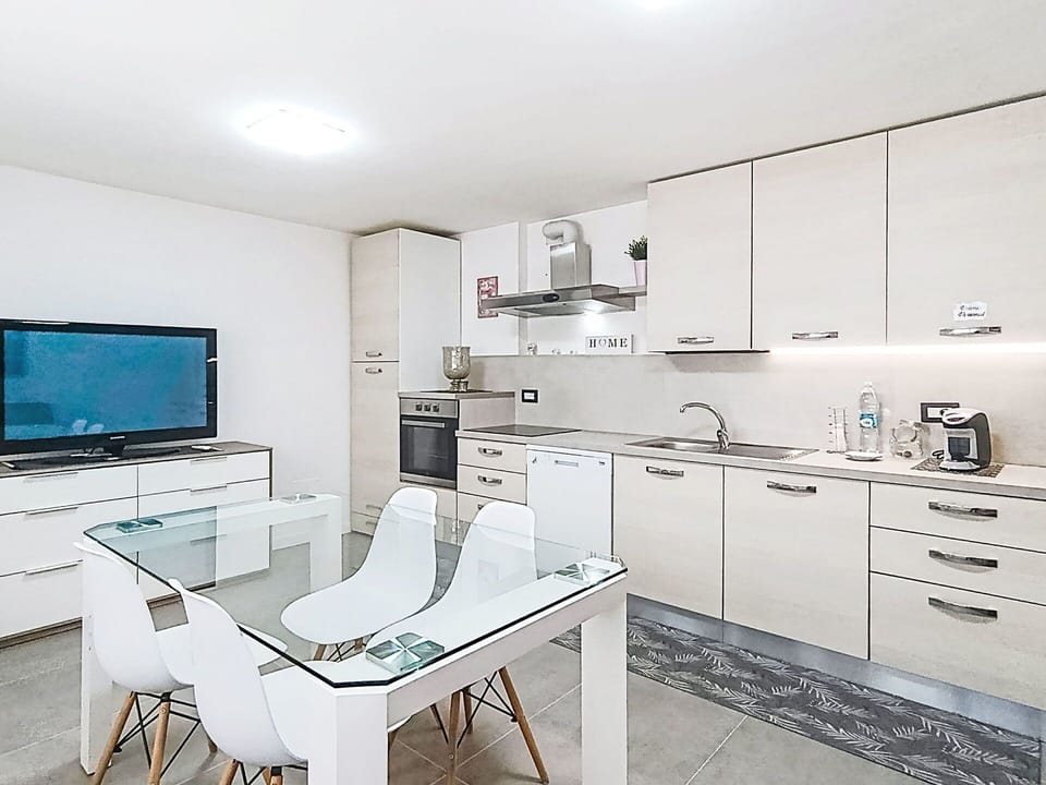 Furniture, Flooring, Interior Design, Kitchen, Countertop, Floor, Ceiling, Cabinetry, Kitchen Appliance, Room