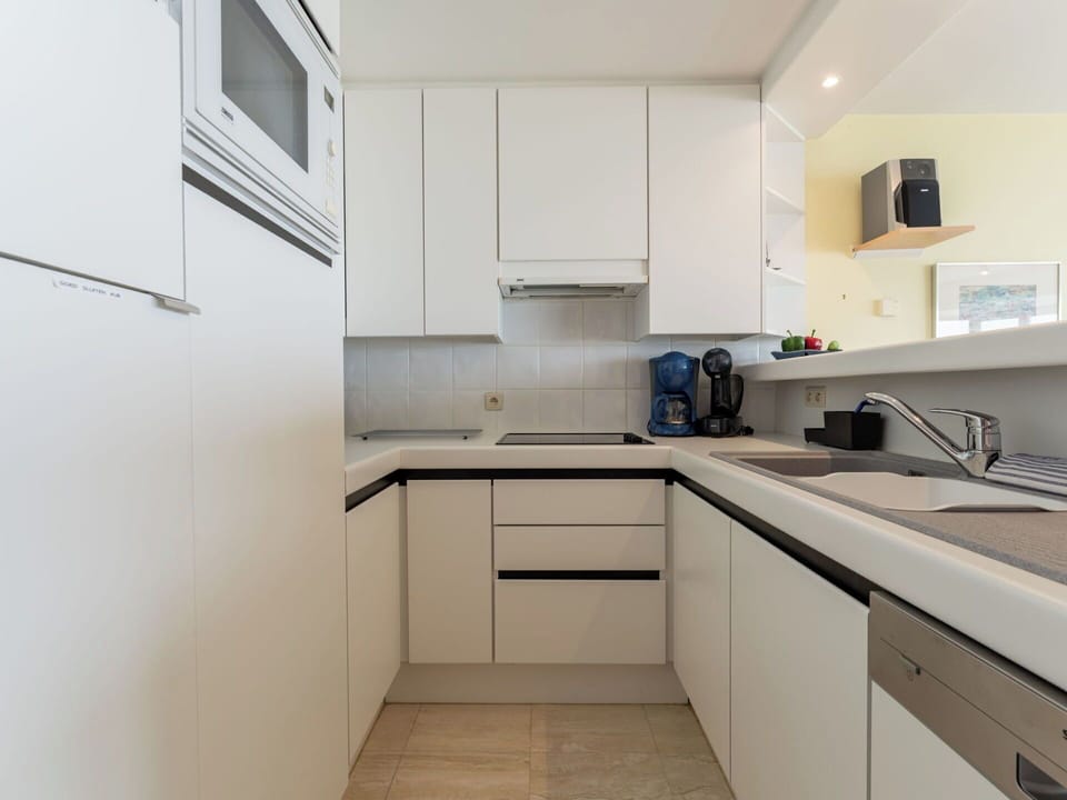 Kitchen, Countertop, Kitchen Appliance, Interior Design, Cabinetry, Flooring, Wood, Major Appliance, Kitchen Sink, Floor