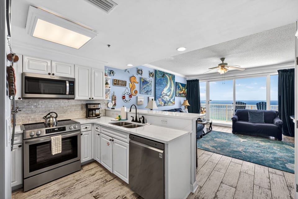 The recently updated, fully equipped kitchen features quartz countertops, stainless-steel appliances, and has everything you need to prepare meals for family & friends.