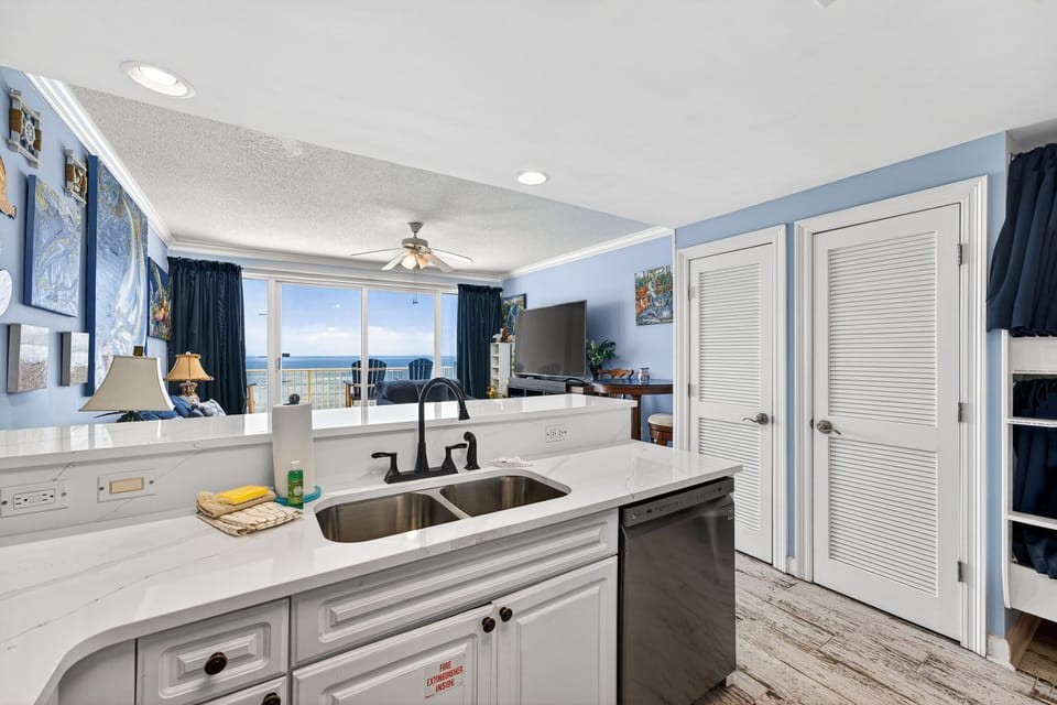 The recently updated, fully equipped kitchen features quartz countertops, stainless-steel appliances, and has everything you need to prepare meals for family & friends.