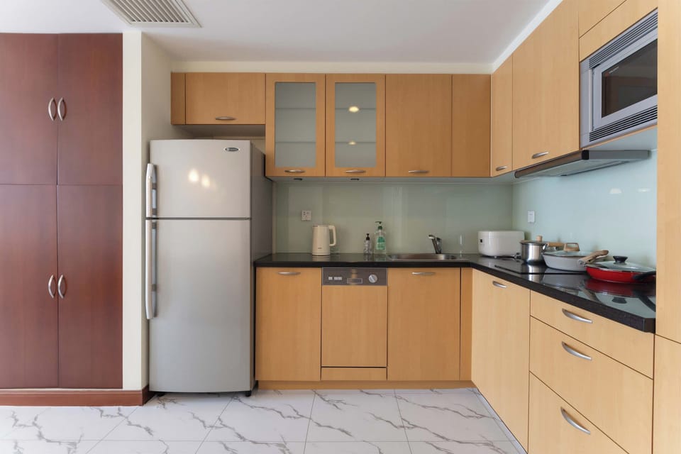 Luxury Suite, City View | Private kitchen | Electric kettle