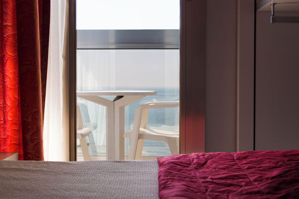 Basic Double Room, Balcony, Sea View | Egyptian cotton sheets, premium bedding, memory foam beds, in-room safe