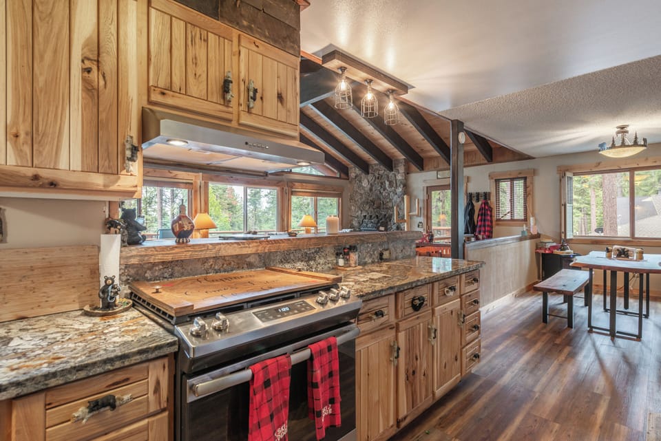 Bear themed handles and newly refaced cabinets. Stay in and cook!