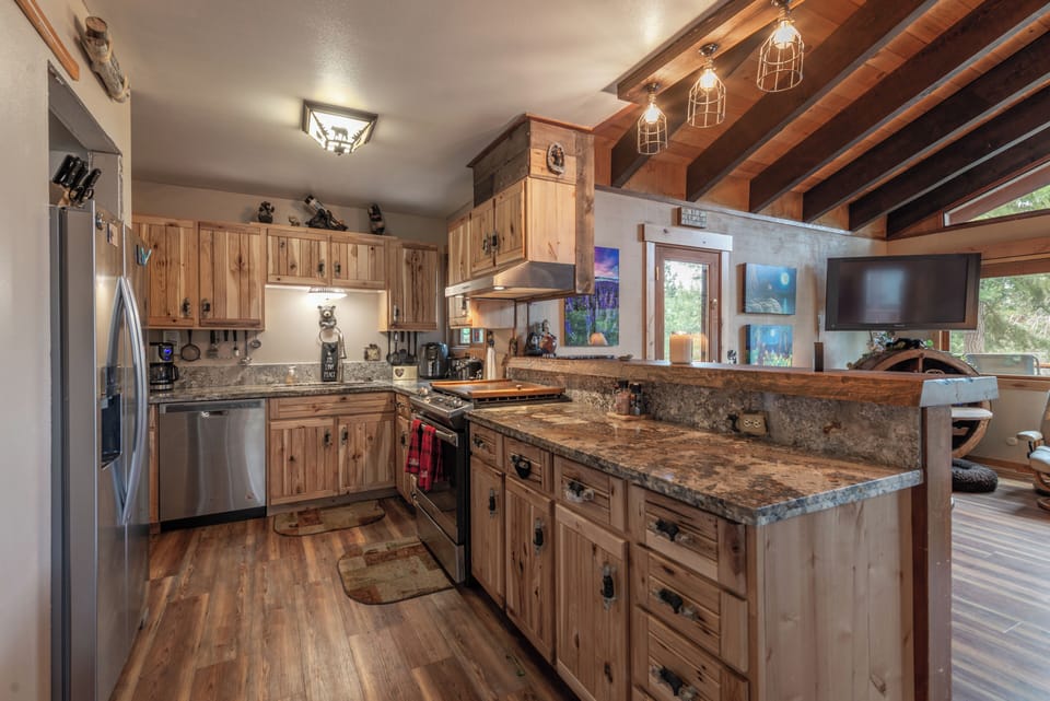 Open concept kitchen. Lots of bears! 