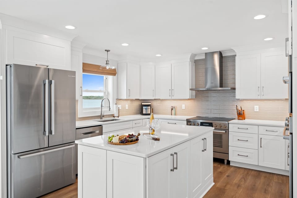 Spacious gourmet kitchen designed for effortless cooking with plenty of prep space and modern stainless appliances