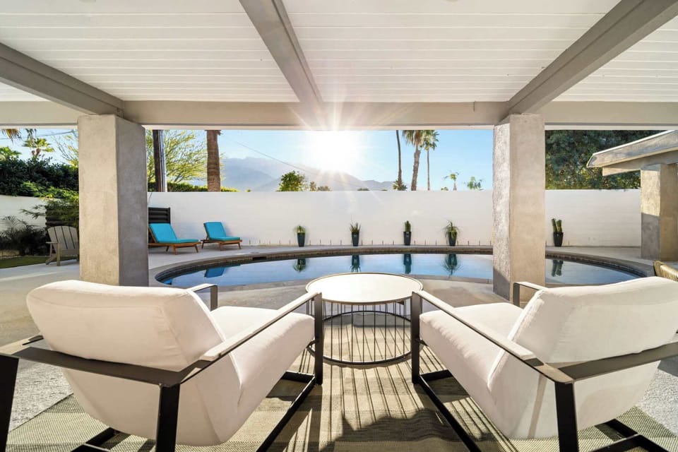 Relax in the shaded lounge by the pool