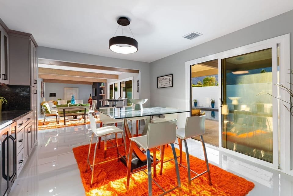 Modern kitchen with bar seating and light