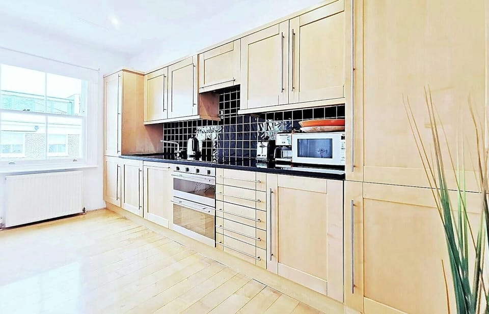 Full granite and solid maple kitchen
