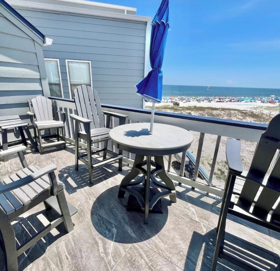 Private Balcony with seating for 8 and umbrella