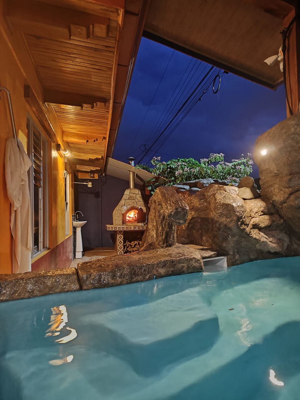 outdoor pool, terrace patio volcano view 
