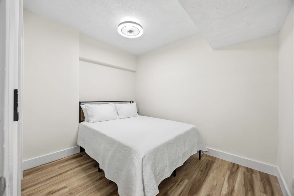 Guest bedroom with queen bed and natural light [BR2] 1 Queen
