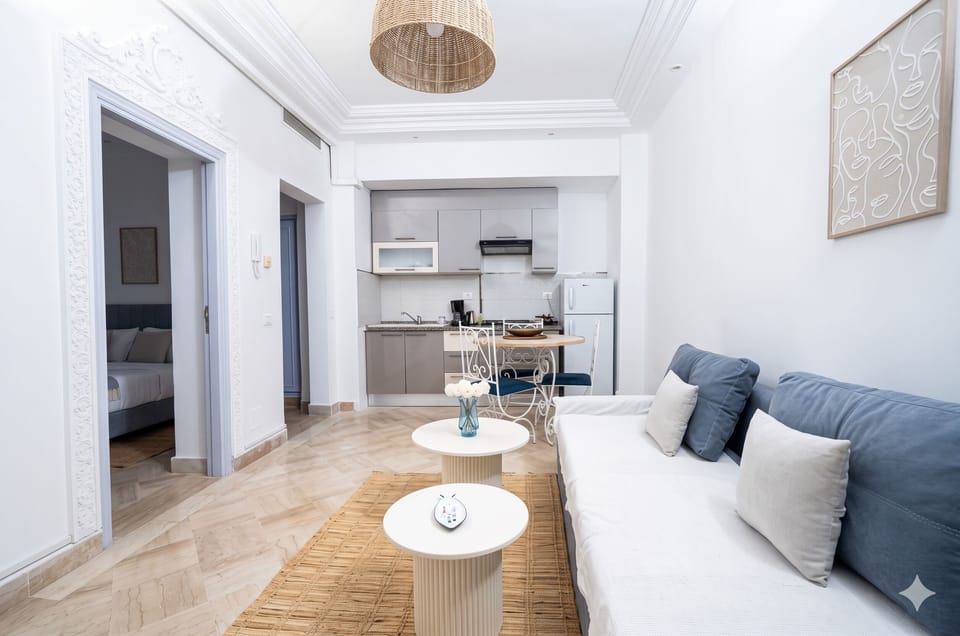 Comfort Apartment, Private Bathroom, Garden View | Living area | 55-cm flat-screen TV with cable channels, streaming services