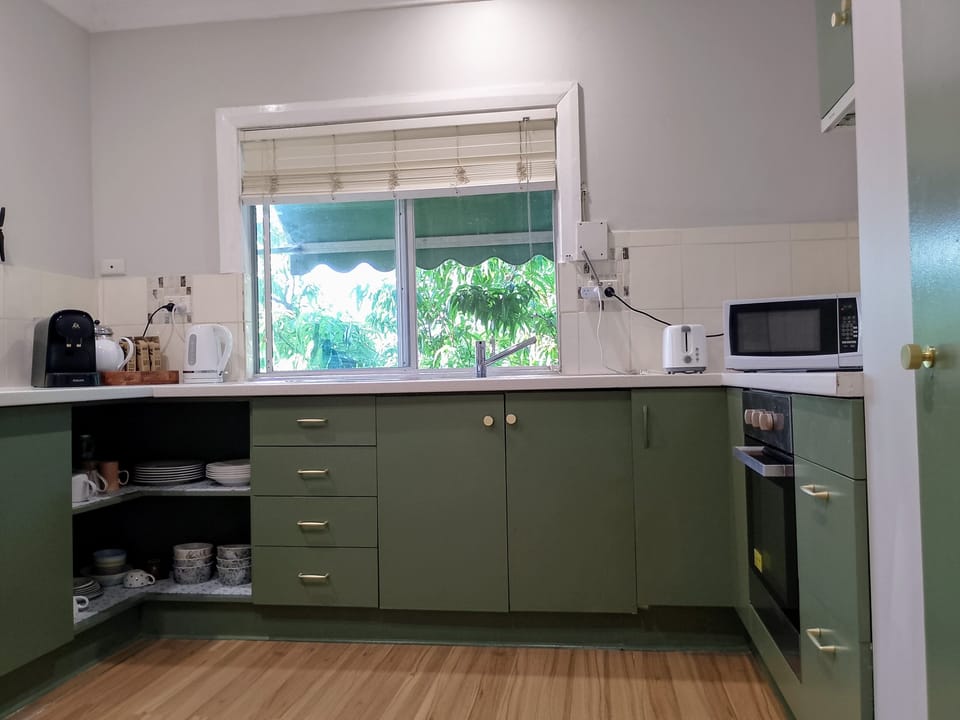 Kitchen: Tea/Coffee Area.
Dishwasher under sink