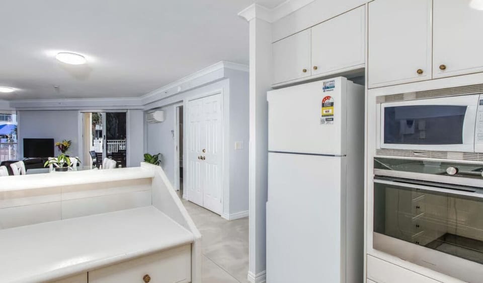 Apartment, Balcony, Pool View | Private kitchen