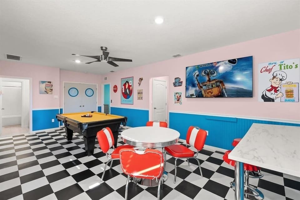 Step into a fun retro diner-style game room with bold colors, checkered floors, and classic seating. Enjoy a game of pool, relax with friends, or dine in a lively space designed for entertainment and unforgettable moments.