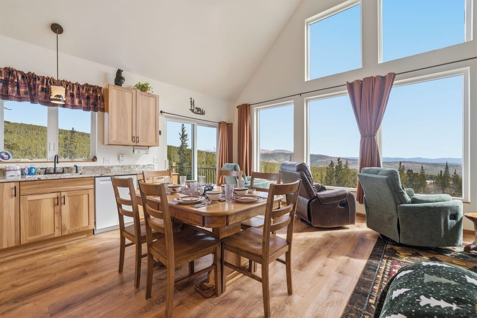 Fully stocked with dishes, kitchen gadgets, and cooking accessories, brand new appliances, and offers comfortable seating for 6 around the dining table.