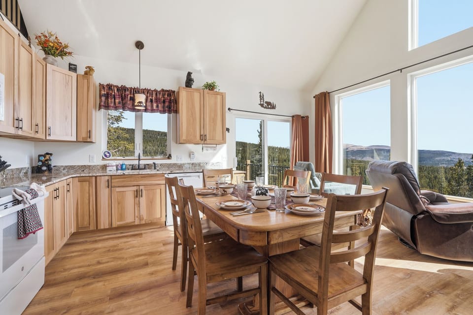 Fully stocked with dishes, kitchen gadgets, and cooking accessories, brand new appliances, and offers comfortable seating for 6 around the dining table.