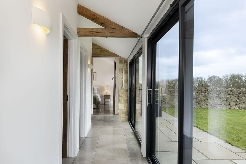 The Cattle Shed Sitting Room - StayCotswold