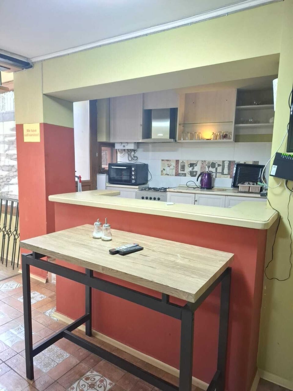 Deluxe Triple Room, Lanai, Courtyard View | Shared kitchen | Fridge, microwave