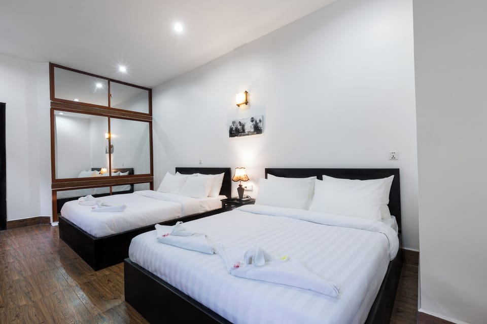 Family Twin Room | Minibar, desk, laptop workspace, free WiFi