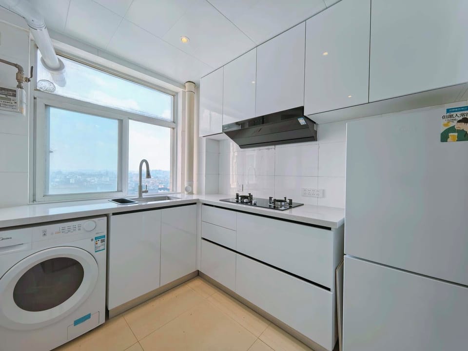 Standard Suite, City View | Private kitchen | Electric kettle, cleaning supplies, paper towels