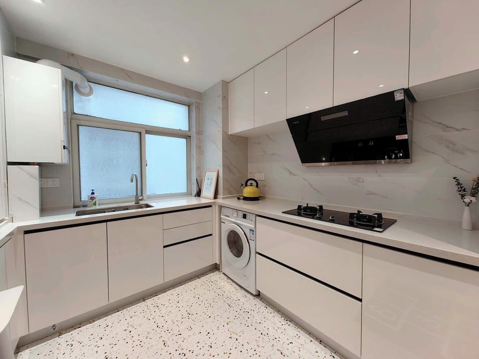 Superior Suite, City View | Private kitchen | Electric kettle, cleaning supplies, paper towels