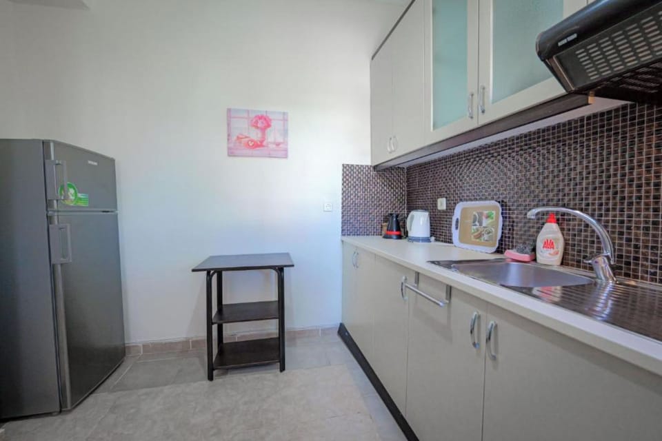 Classic Quadruple Room | Private kitchen