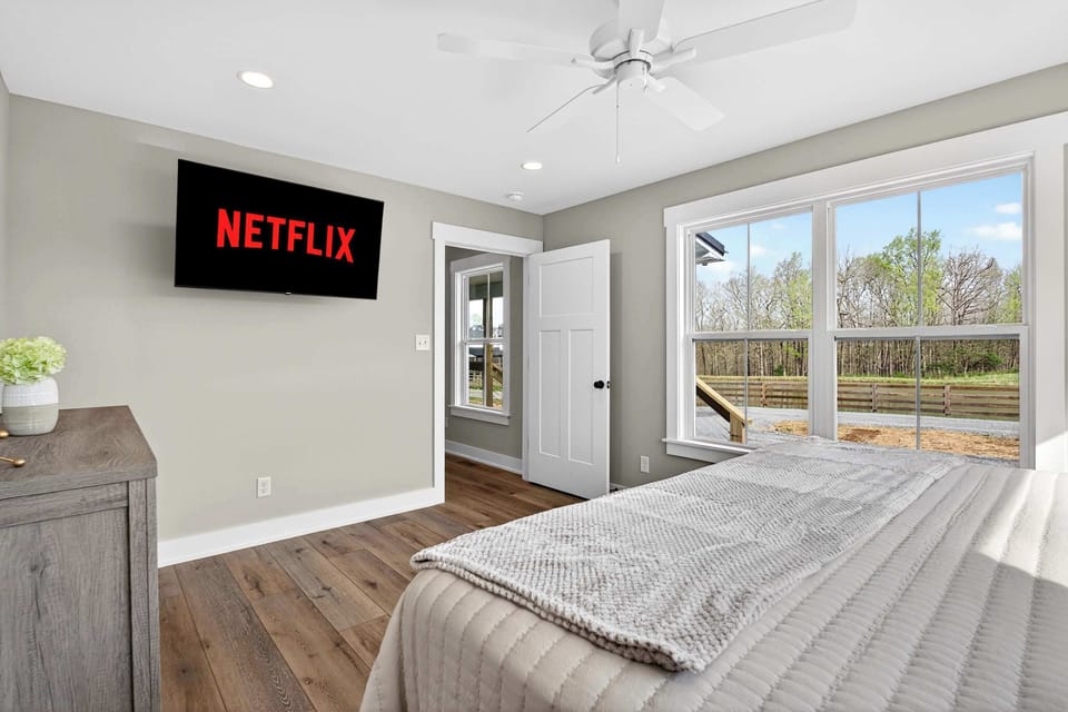 Bedroom 1: A cozy and elegant bedroom perfect for a peaceful night’s rest.