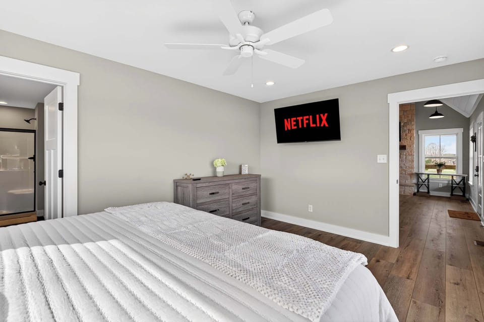 Bedroom 1: A cozy and elegant bedroom perfect for a peaceful night’s rest.