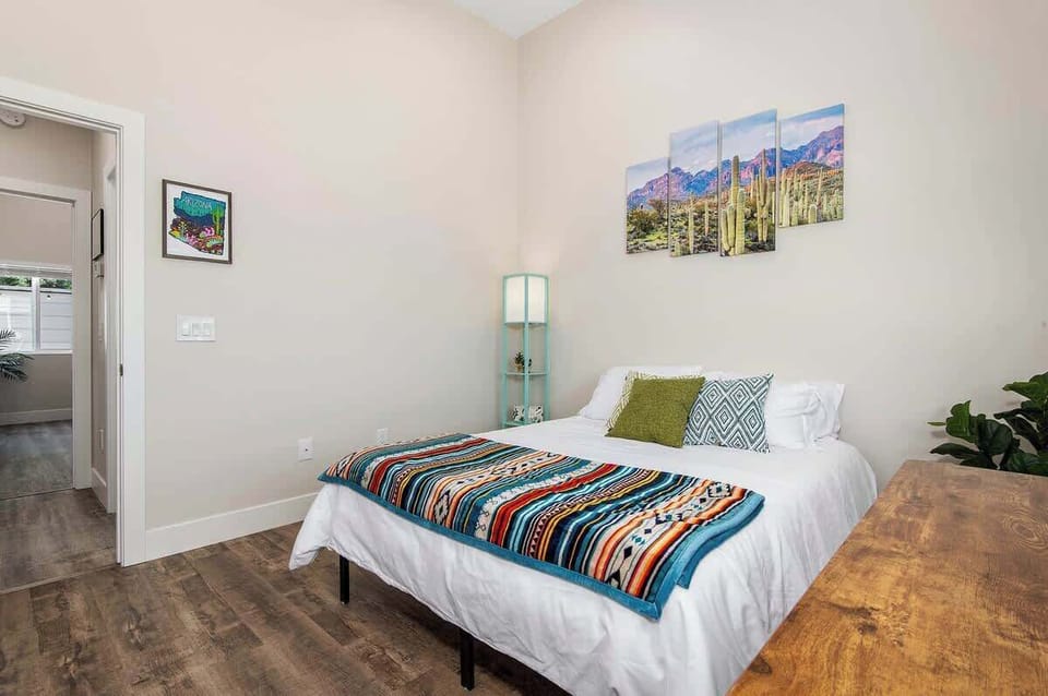 Balance your dreams and responsibilities in this harmonious bedroom with a study table. A space where inspiration meets productivity