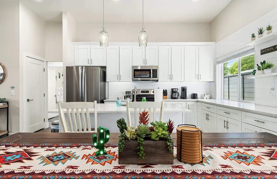 A great view of our pristine kitchen to enjoy a meal and have memorable conversations over a drink or two