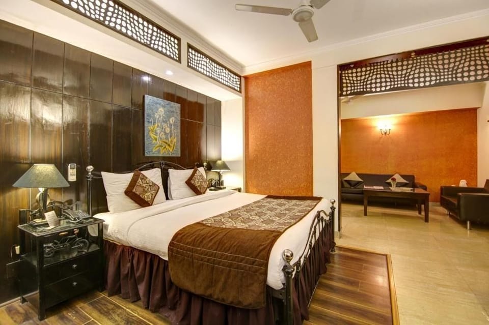 Luxury Studio Suite, Balcony, City View | In-room safe, blackout drapes, soundproofing, iron/ironing board
