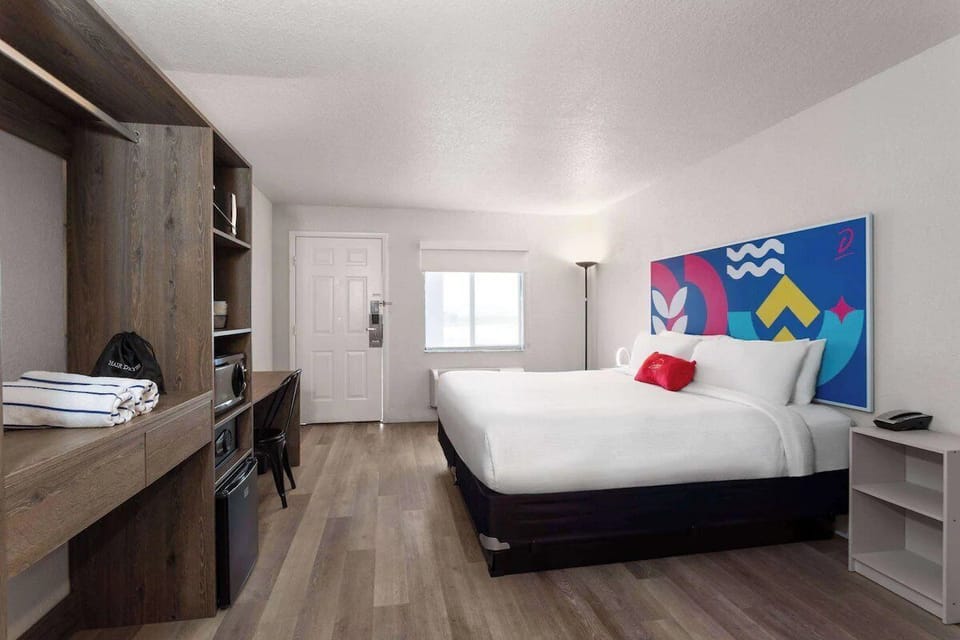 Settle in with spacious storage, desk workspace, and crisp bedding.