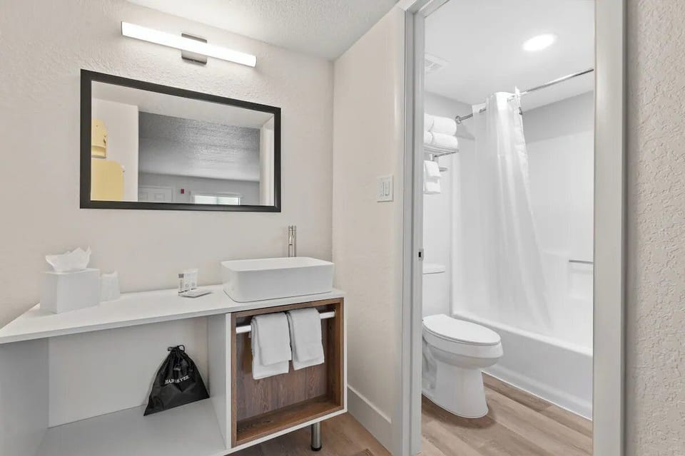 Plan your day comfortably with extra shelving and a work chair.