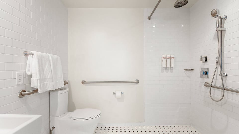 Refresh under the rainfall shower in a spotless, spa-like bath.