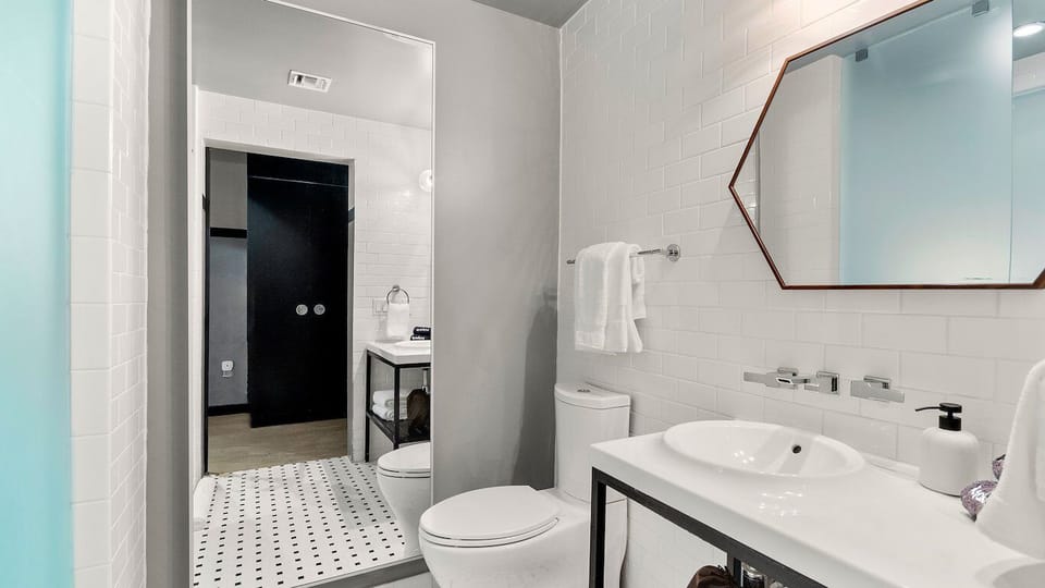 Pamper yourself at the bright vanity with plush towels.