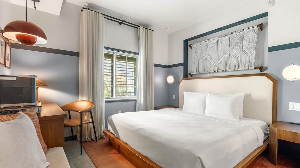 Sink into plush bedding and enjoy a serene, stylish retreat.
