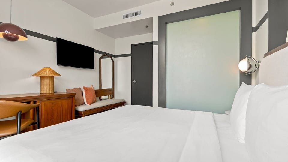 Wake to blue skies and palms just beyond your glass doors.