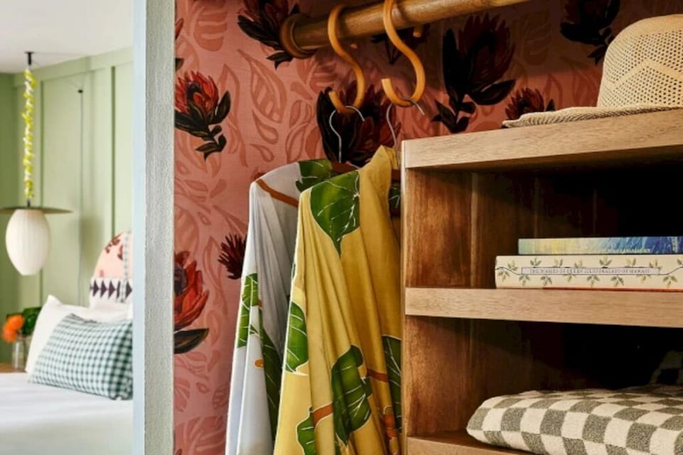 Stow luggage neatly and enjoy the room’s playful details.