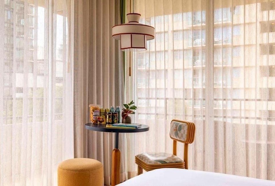Sip morning coffee by the window in a cozy nook.