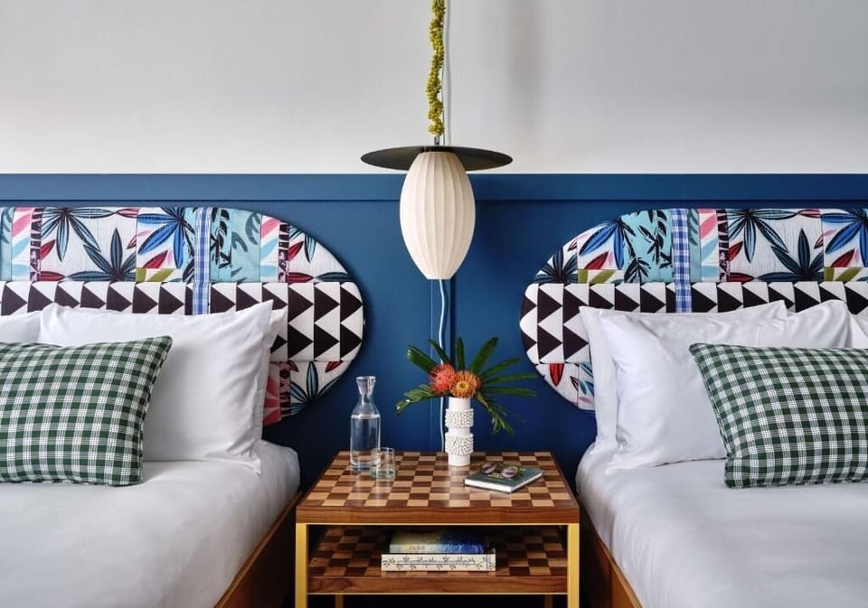Admire bold headboards and drift into deeper sleep.